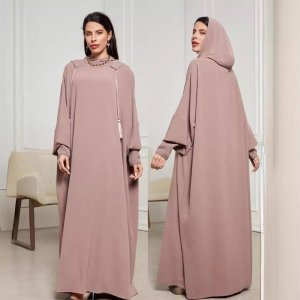 Long-sleeve modest dress with tassel detail elegant abaya for women loose fit breathable fabric for formal events casual wear and graceful styling