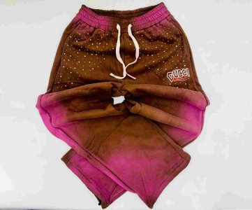 Gucci Embroidered Jogger Pants for Men – Luxury Streetwear with Signature Logo Patch, Tapered Fit, Adjustable Waist, Dot Accents, Premium Stitching